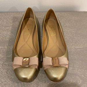 Salvatore Ferragamo Metallic Gold Flats with Beige Bow